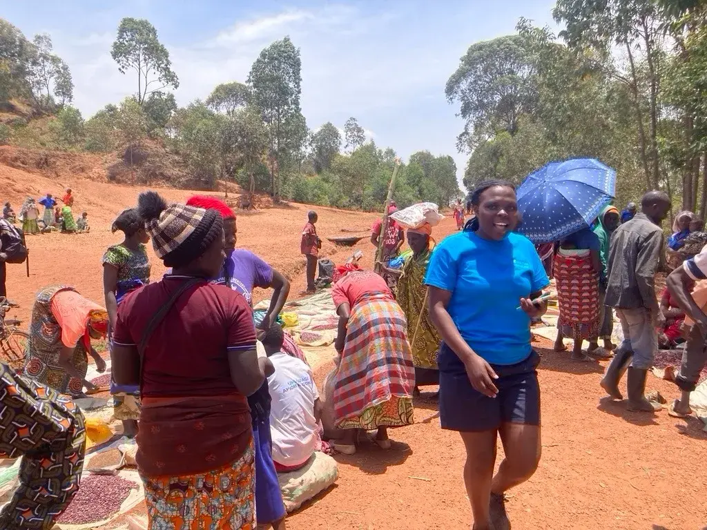 A community gathering in Gakenke with e.quinox team members